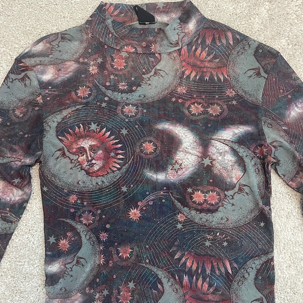 Urban Outfitters long sleeve mesh top.